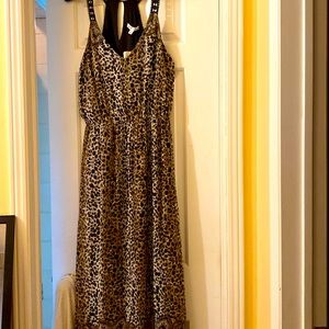 Leopard print sheer dress with black slip.  Straps are embroidered
